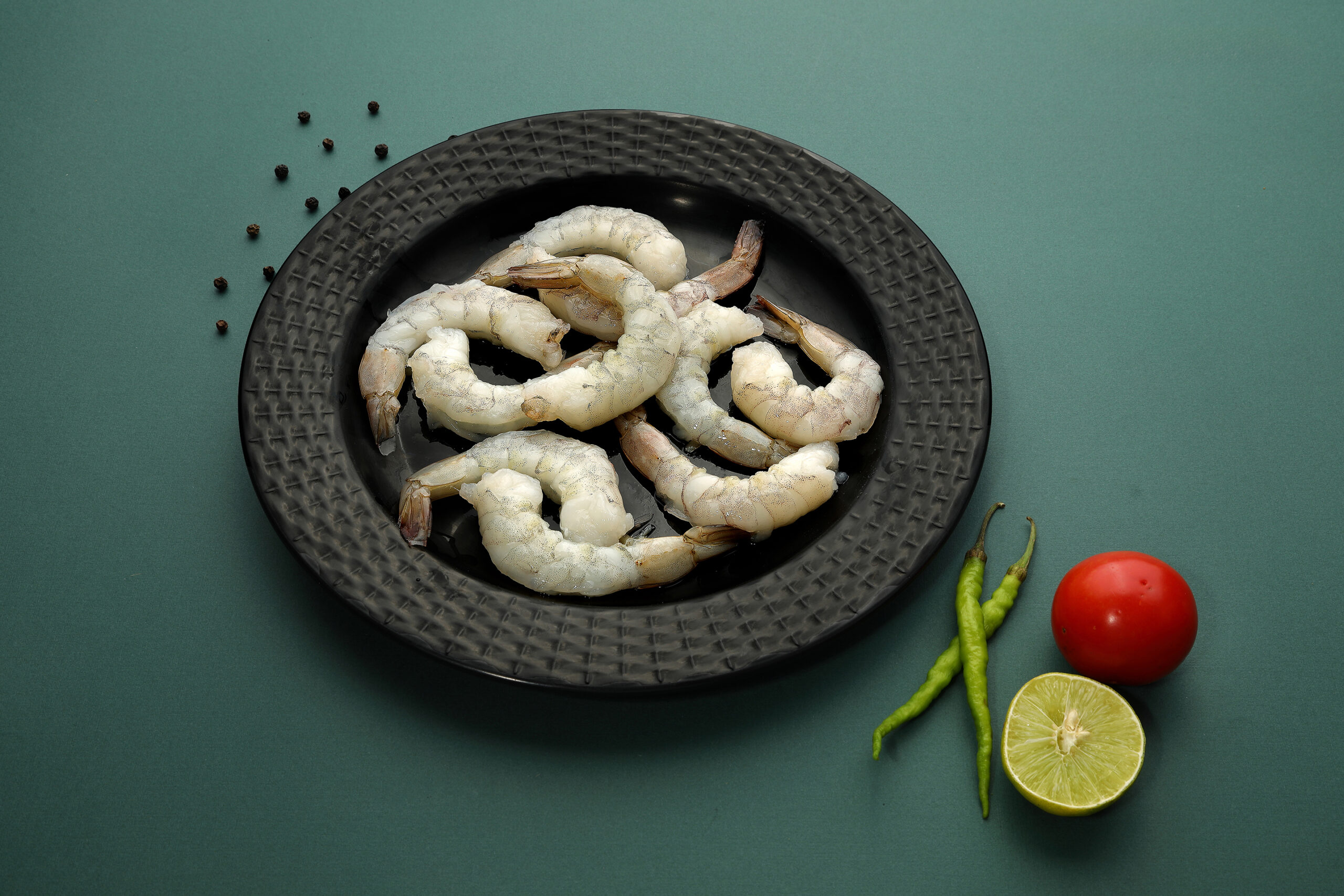 Creative seafood food photography with prawns, fresh ingredients, and minimal styling
