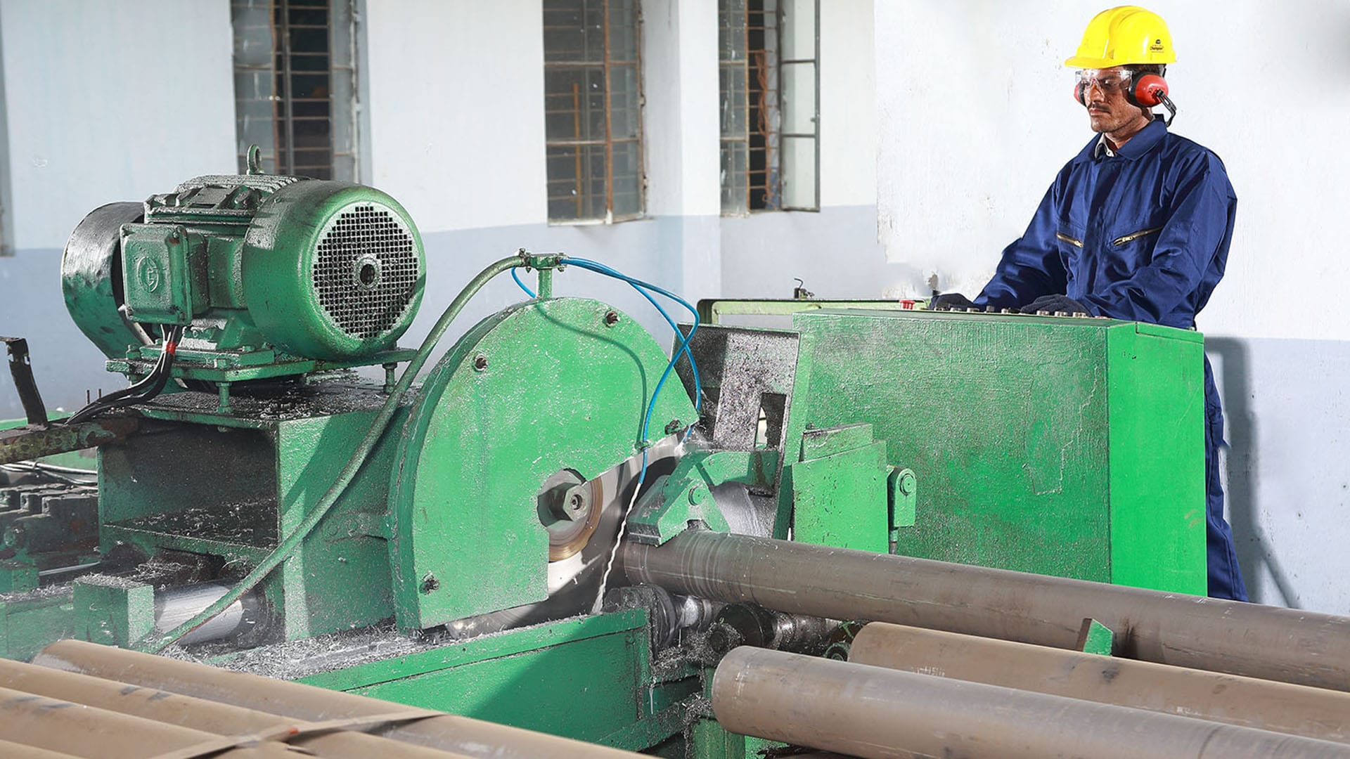 industrial machine operator working on heavy machinery | profess